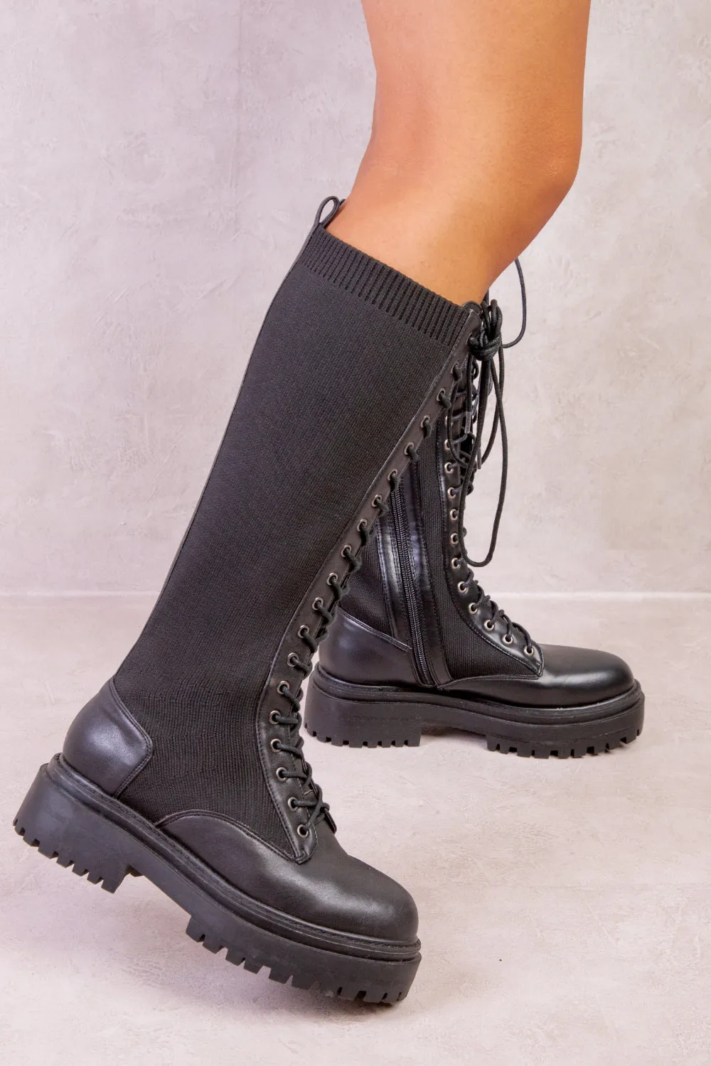 DYANNA KNITTED PANEL LACE UP CALF BOOTS IN BLACK FAUX LEATHER